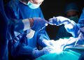surgeons using surgical scissors